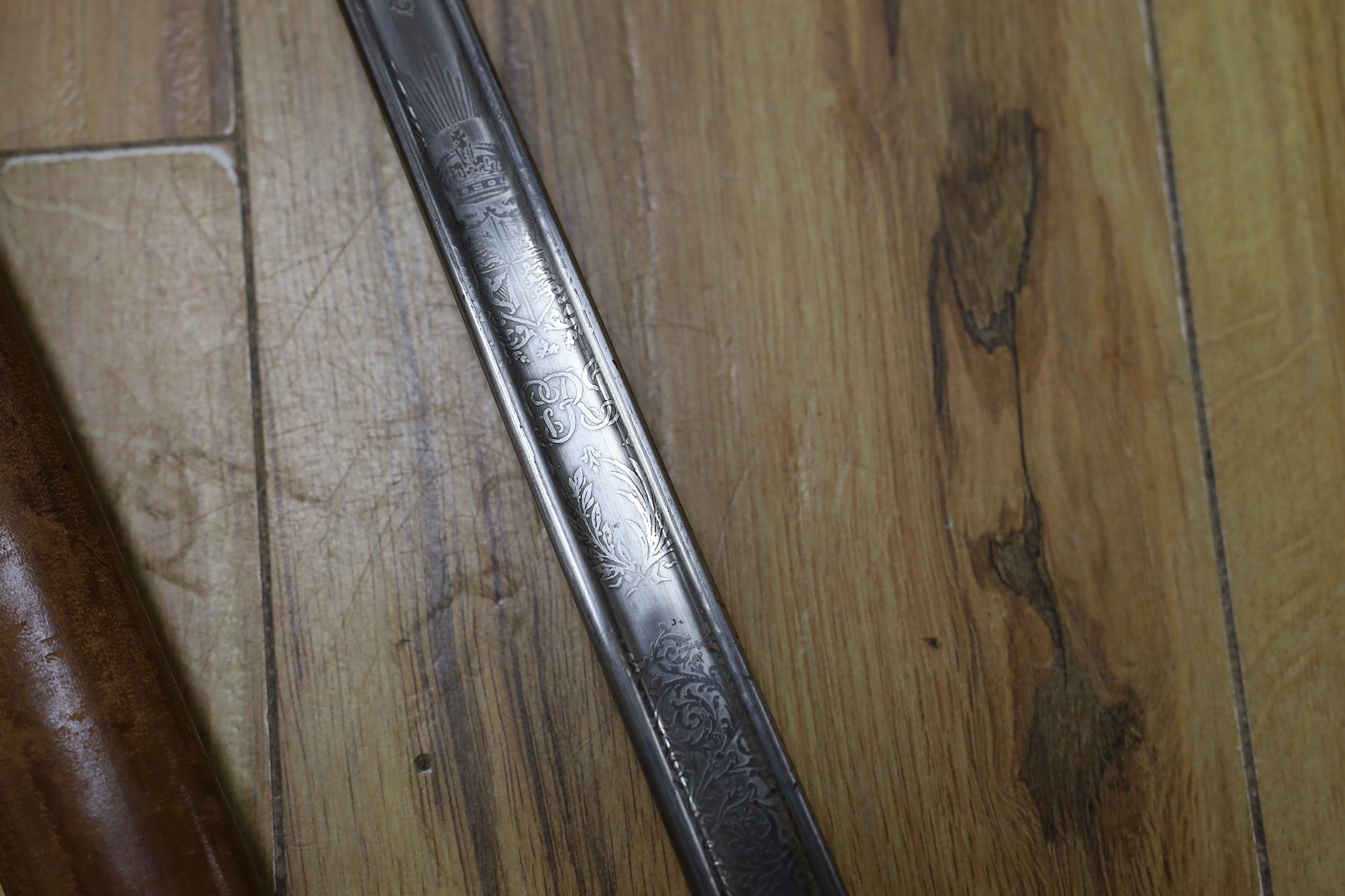 A Wilkinson George V officer's dress sword, stamped 1930 with broad arrow